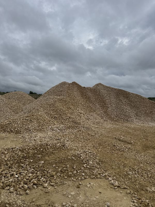Pile of crushed base material at the pit