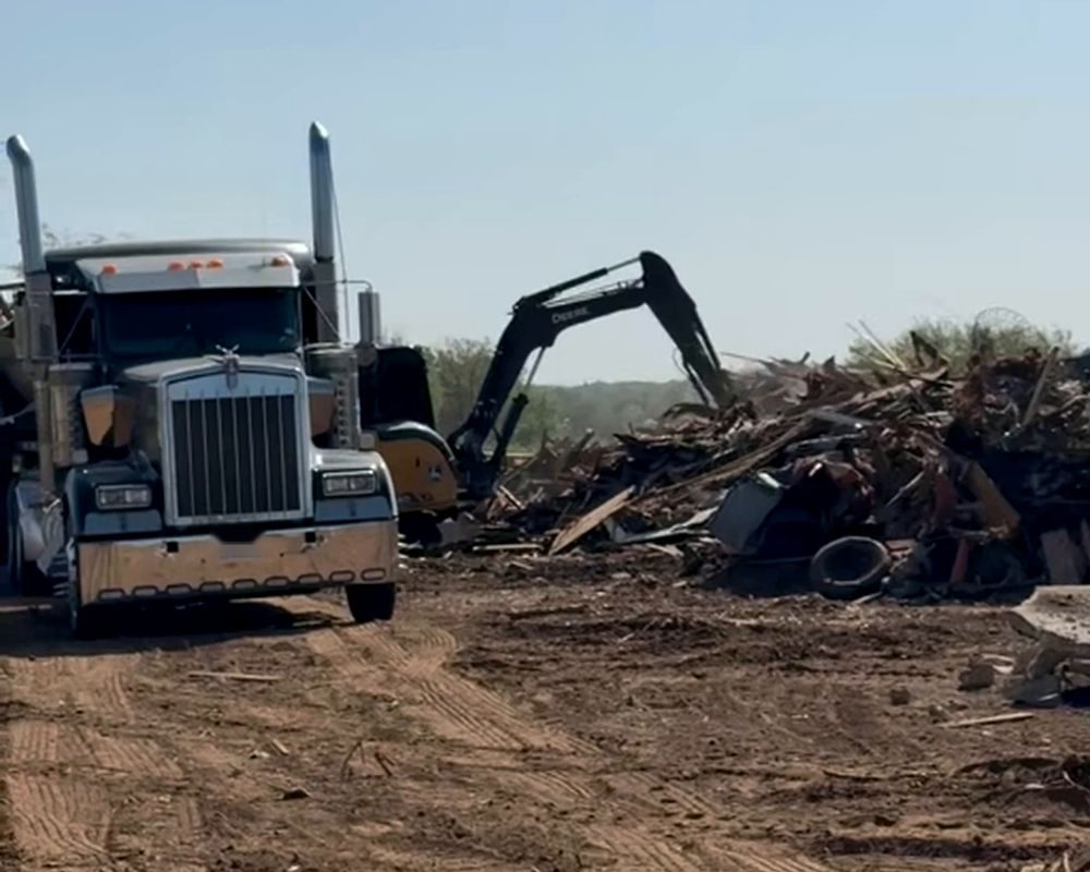 End dump at a demolition debris pile