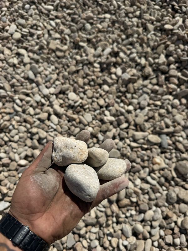 River rock in hand